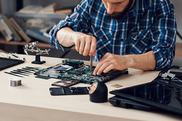 IT technician working with computer systems